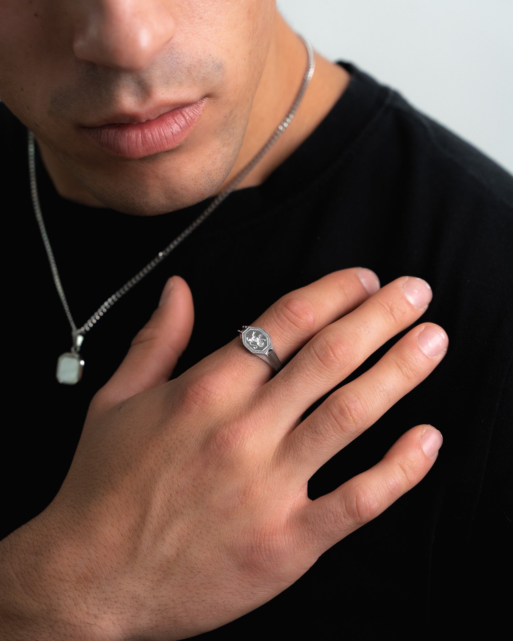Legacy Silver Ring on finger shown from the side with the octagonal bezel.