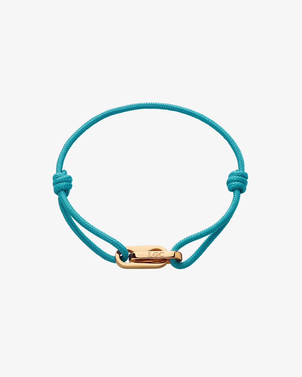 Atlantis Gold Bracelet turquoise cord with a polished gold clasp.