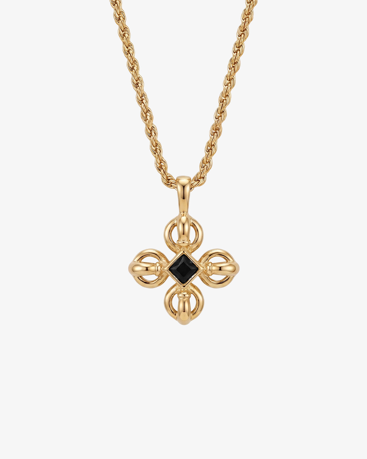 Gold flare necklace featuring a sunburst framed pendant with a black oval gemstone