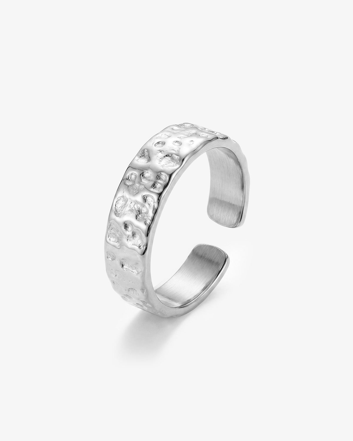 Hammered gold tone open-ended ring with a wide textured band