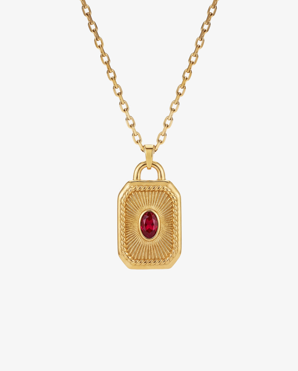 Collar de cadena de oro con colgante labrado con una gema roja