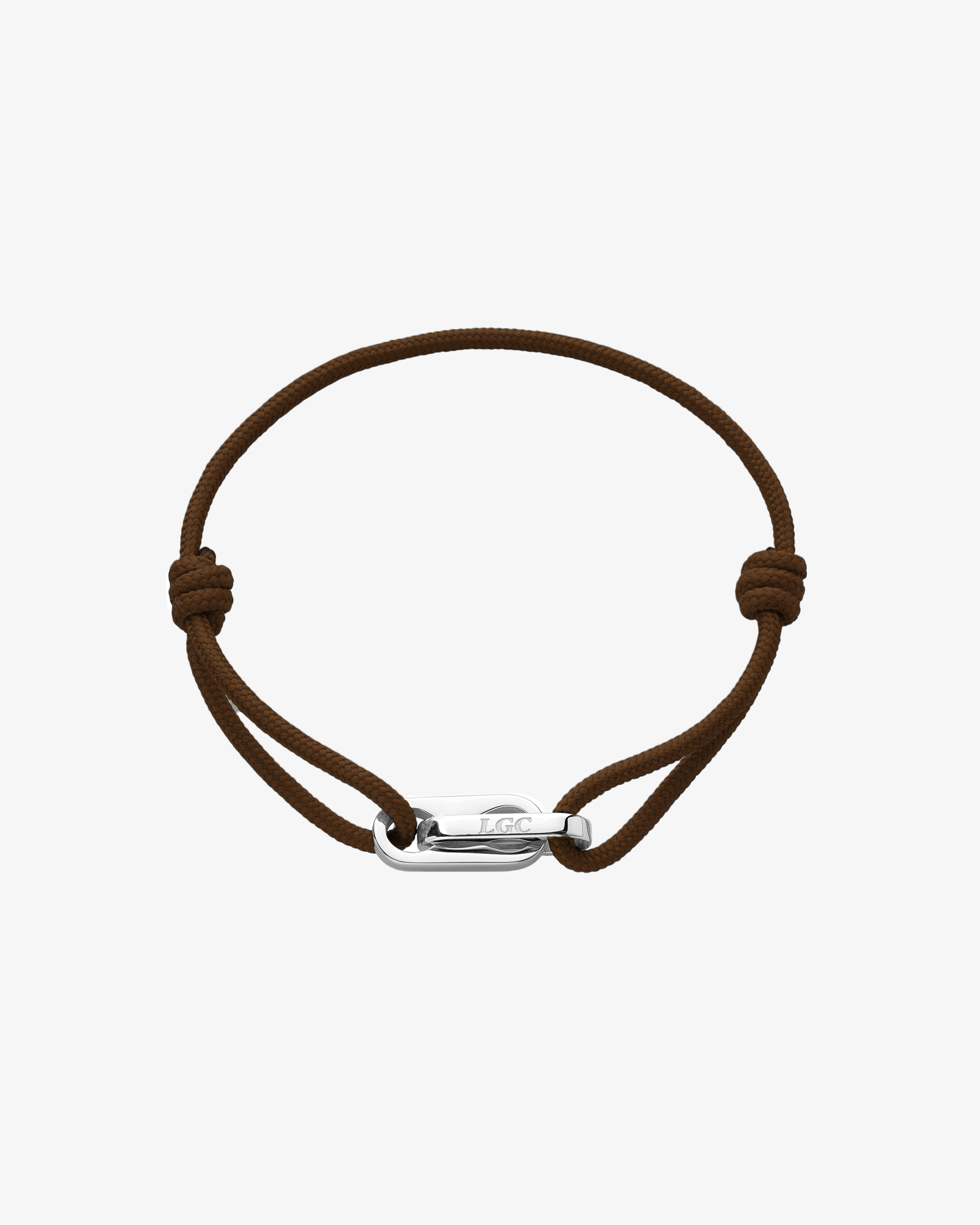 Atlantis Silver Bracelet with brown braided cord and silver clasp on white background