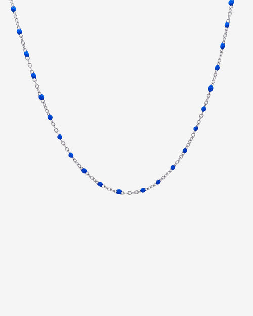 Gem silver chain necklace with evenly spaced blue beads along the chain