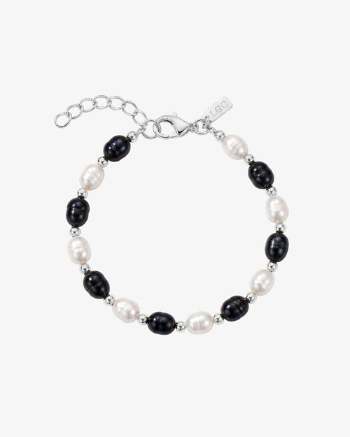 Melasti Pearl Bracelet with alternating white and dark freshwater pearls on an adjustable chain