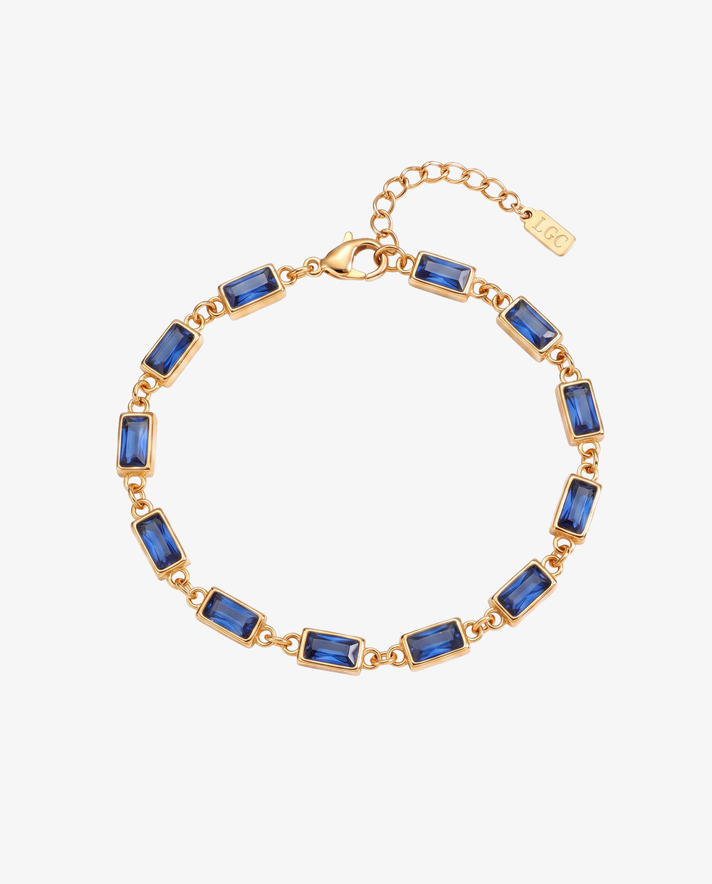 Pulsera de oro con piedras rectangulares azules engarzadas a lo largo de la cadena