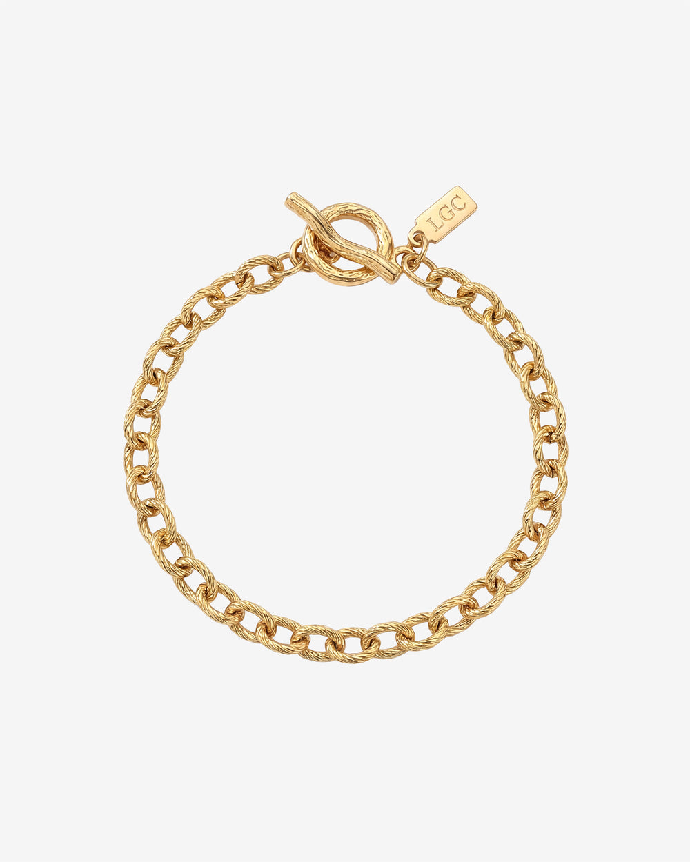 Pulsera dorada Saona con eslabones texturizados y cierre de barra circular