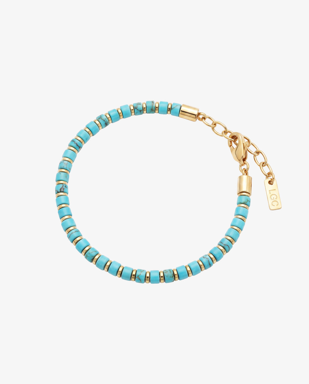 Pulsera de cuentas turquesa con separadores y cierre de oro sobre fondo blanco